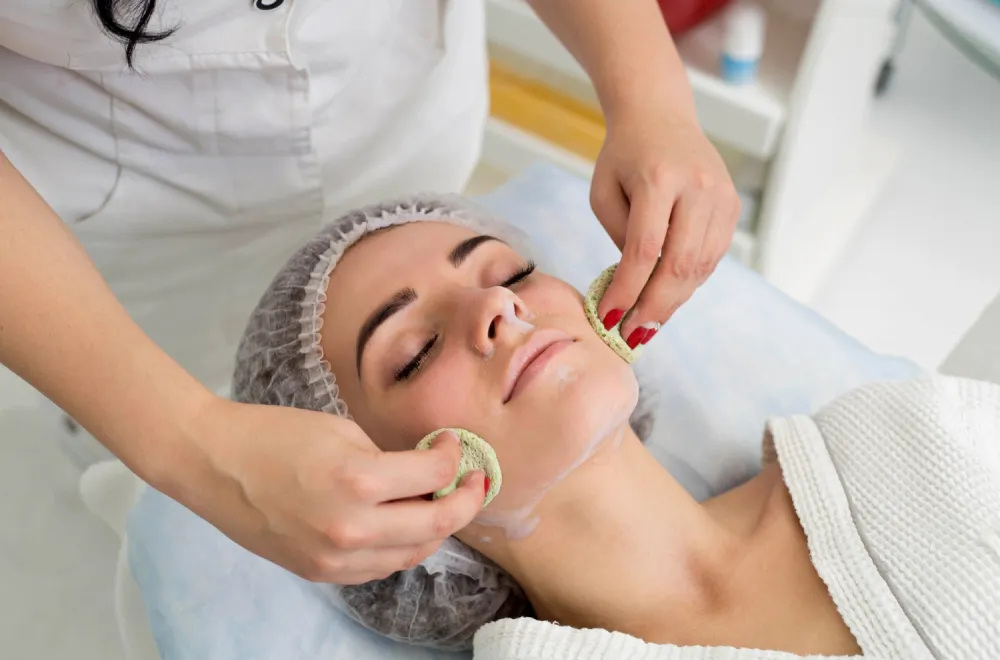 Client receiving a hydrating facial at Zuri Beauty Lounge in Jumeirah, Dubai